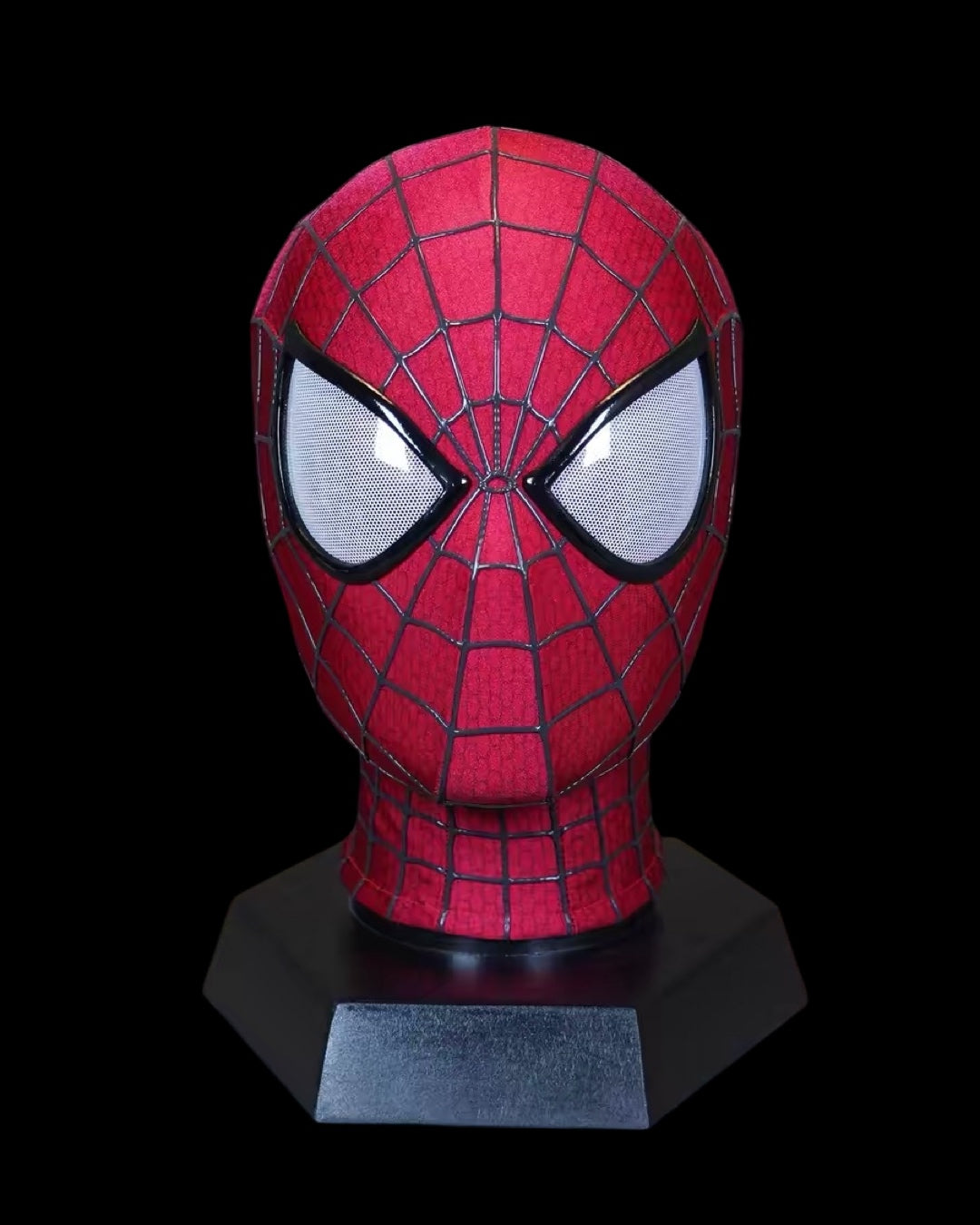 Amazing Spider-Man 2 mask with black web patterns on a black background
